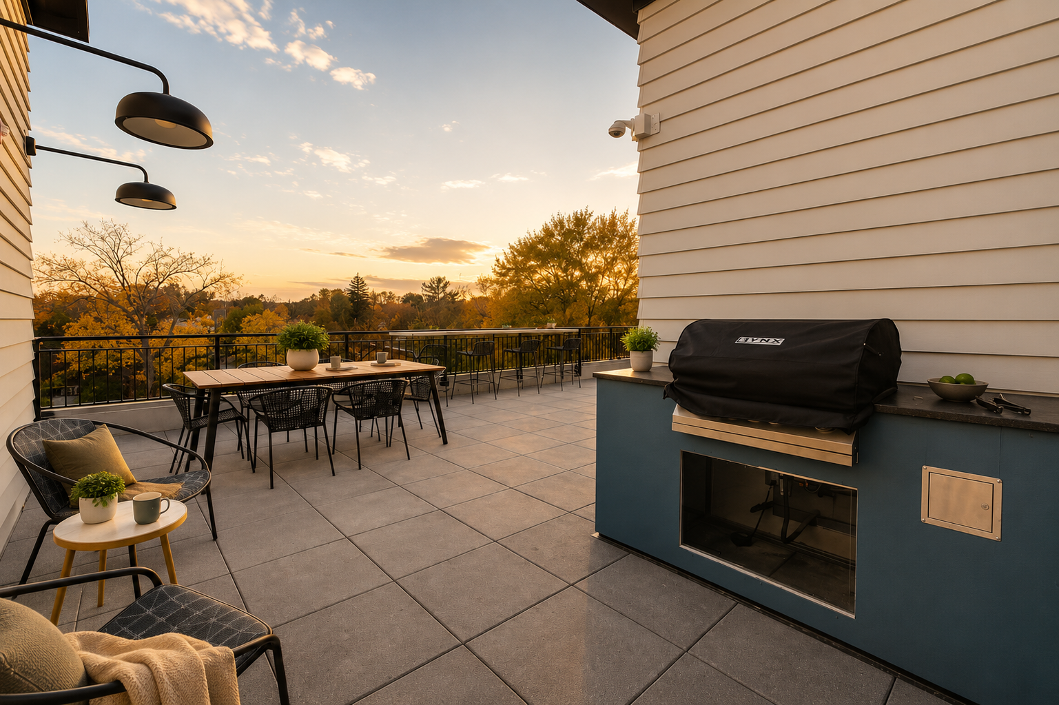 the community balcony with a grill and seating